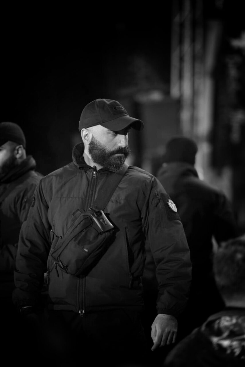 COPERSEC agent on duty at a night event